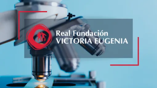 En el fondo, una fotografía de un microscopio, sobre él, en el centro de la imagen el logo de la Real Fundación Victoria Eugenia
